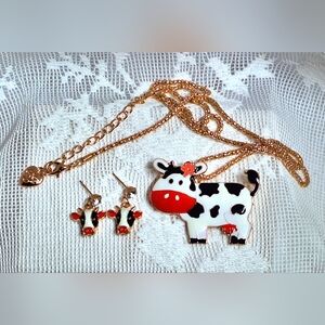 Cow pendant & earrings are gold tone with red, white & black enamel, rhinestones